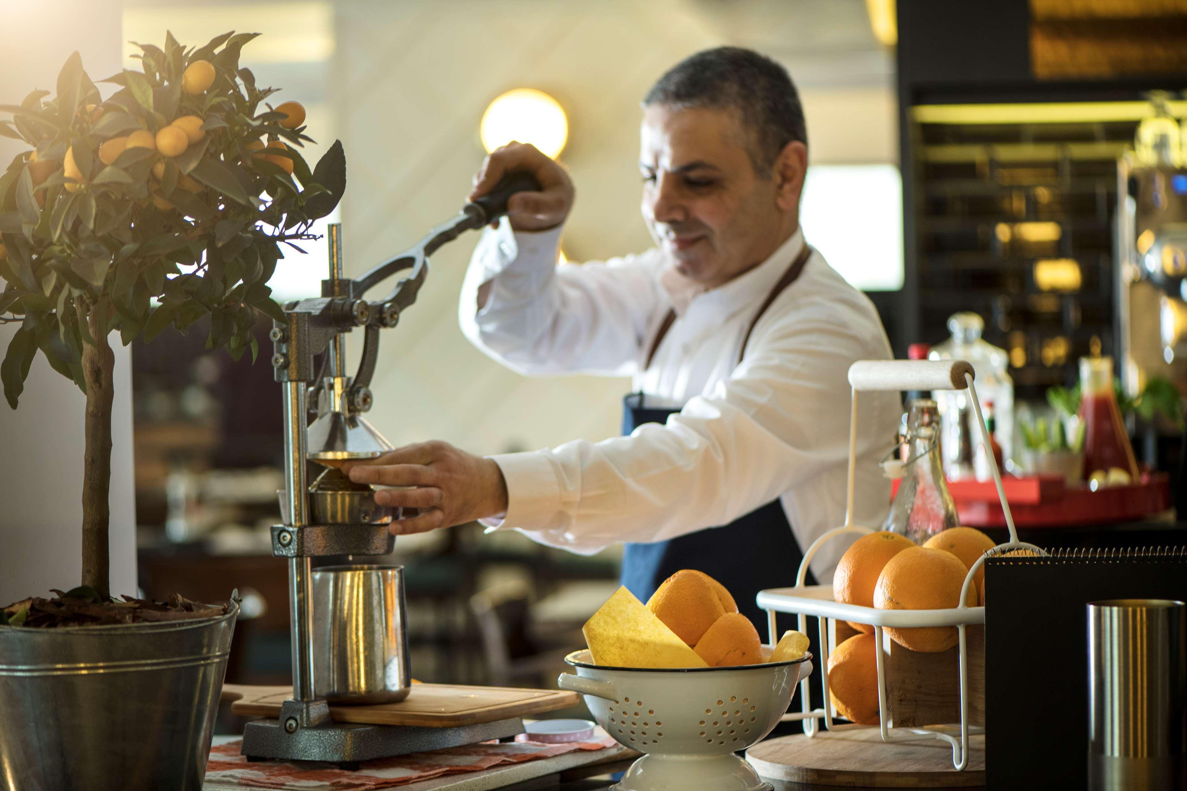 Radisson Blu Hotel, Beirut Verdun Extérieur photo A bartender at work